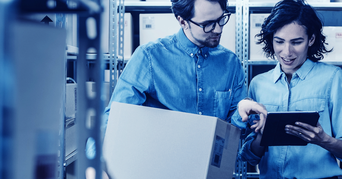 2025_12_Blog_PVX_Metrics and Improvements Every D2C Brand Should Know_Feature Two warehouse workers check an order item on a tablet.