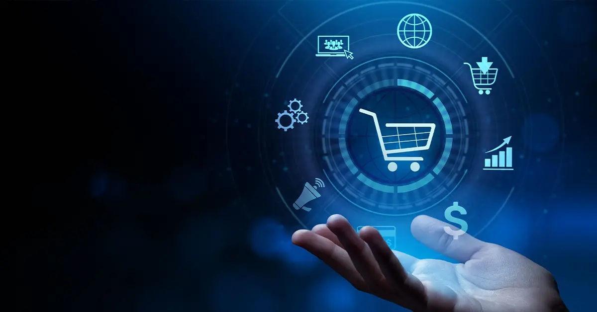 Multichannel Ecommerce The Secret to Direct-to-Consumer (DTC) Brand Survival in 2026 A person’s hand is open, supporting a graphic representation of multichannel ecommerce, depicted as a shopping cart surrounded by icons for money, gear wheels, a megaphone, an upward trending bar graph, a shopping cart with a down arrow, a credit card, a globe, and a mouse clicking a computer screen.