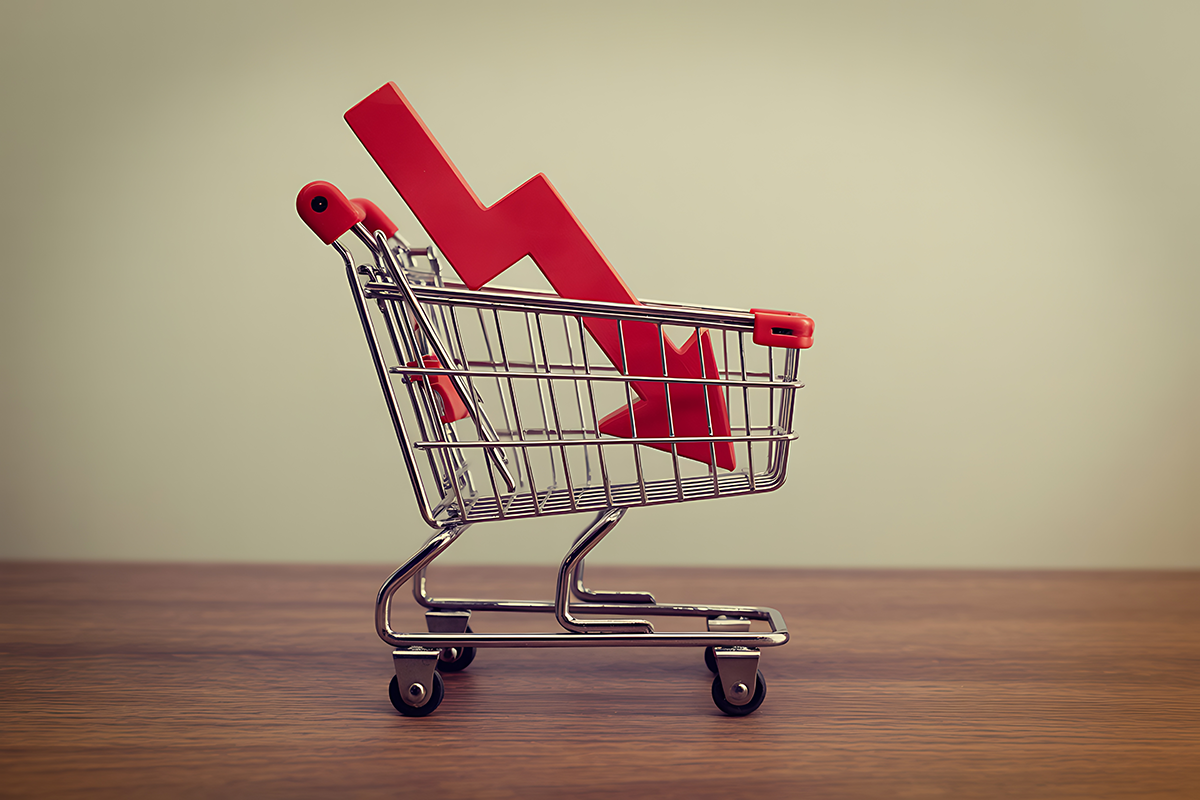 Retail sales are down, depicted as a metal shopping cart holding a downward pointing red arrow.