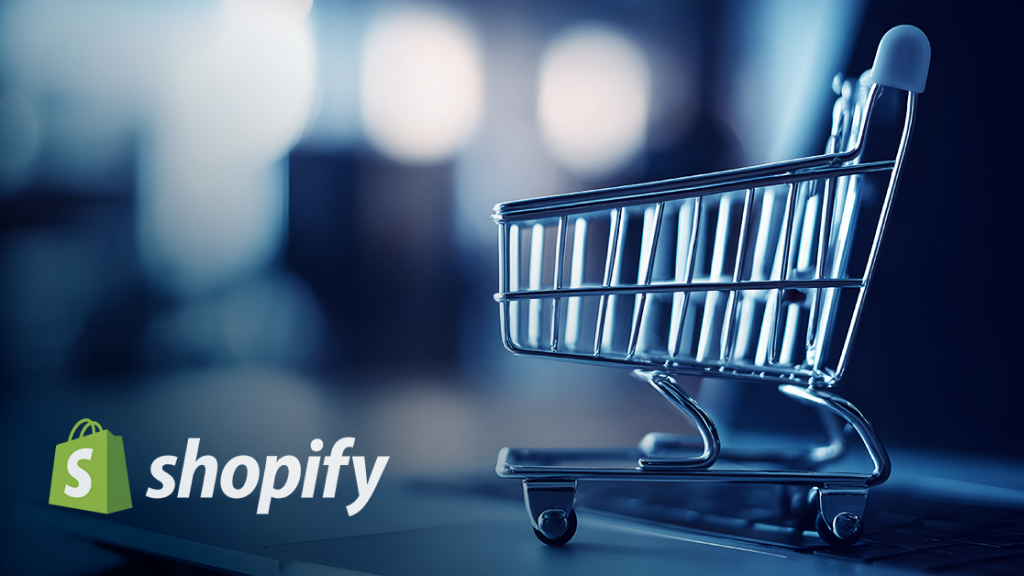 2025_12_Blog_Best WMS For Shopify PVX An image featuring a shopping cart and the Shopify logo.