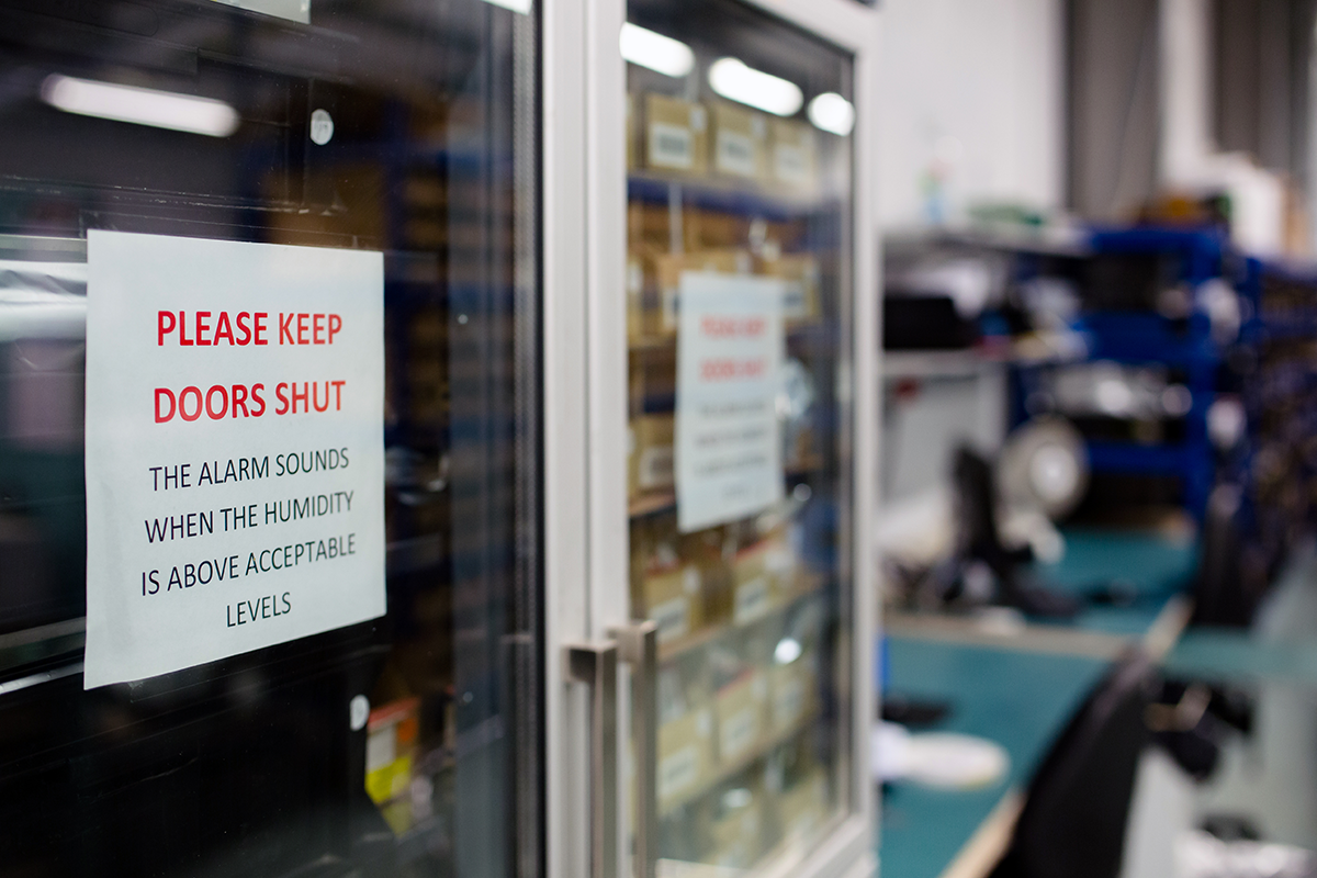 Keep Doors Shut sign serves as a visual aid to remind workers of eco-friendly SOPs