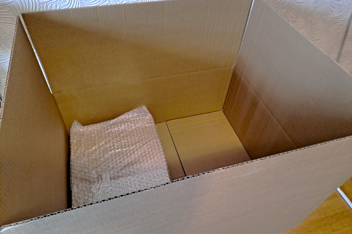 A small package in a box that is too big